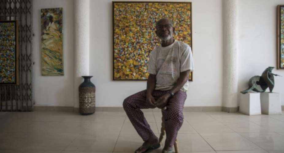 Ablade Glover, Ghanaian artist and founder of the Artists Alliance Gallery in Ghana's capital has won national and international recognition for his work.  By CRISTINA ALDEHUELA AFP
