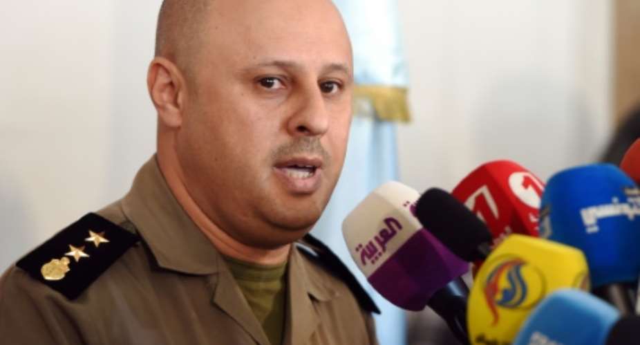 According to local media, Tunisian Defence Minister Belhassen Oueslati, seen in 2015, said army and national guard units were looking for unknown attackers who killed a soldier in his home November 5, 2016.  By Fethi Belaid AFPFile