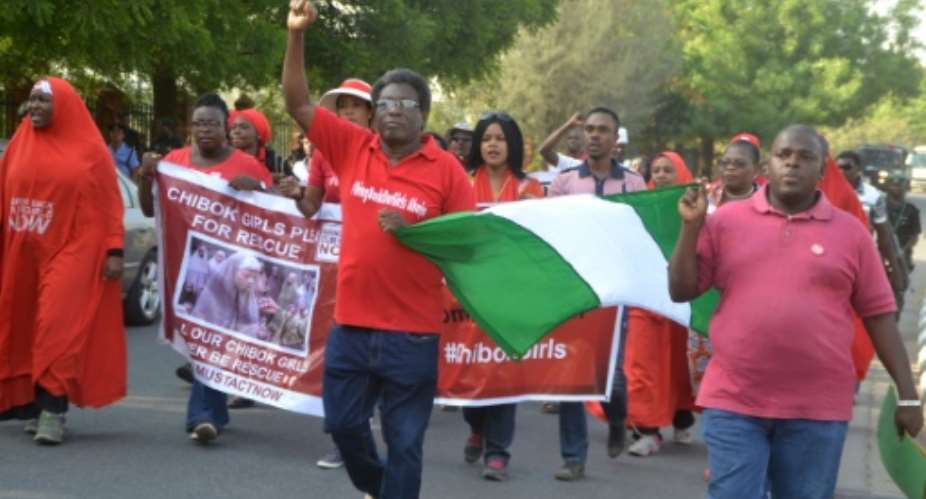 Activists of the online movement bringbackourgirls demonstrate during a march to the Presidential Villa in Abuja on January 8, 2017 to mark the 1000 days since the mass aabduction of the Chibok school girls.  By - AFPFile