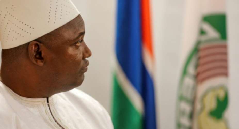 Adama Barrow during his swearing in as president of Gambia at the Gambian embassy in Dakar on January 19, 2017.  By  SENEGALESE PRESIDENCYAFP