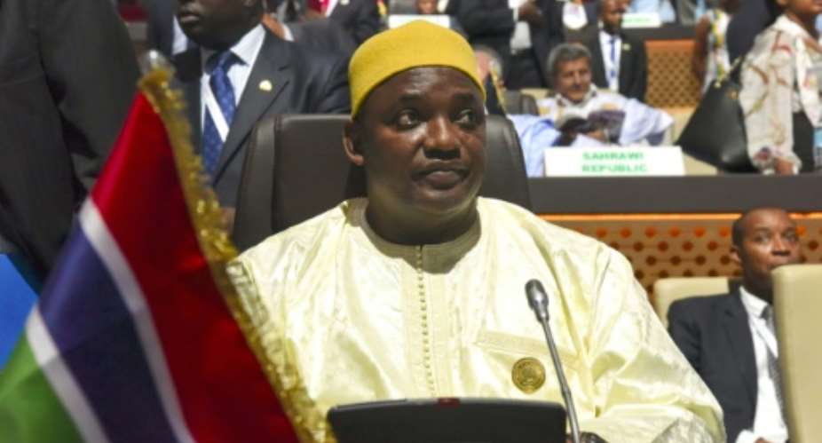 Adama Barrow, president of The Gambia, wants to serve a five-year term after initially vowing to step down after three.  By ISSOUF SANOGO AFPFile
