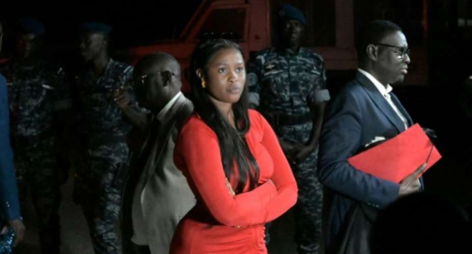 Adji Sarr, 23, says opposition leader Ousmane Sonko raped her and made death threats.  By SEYLLOU (AFP)