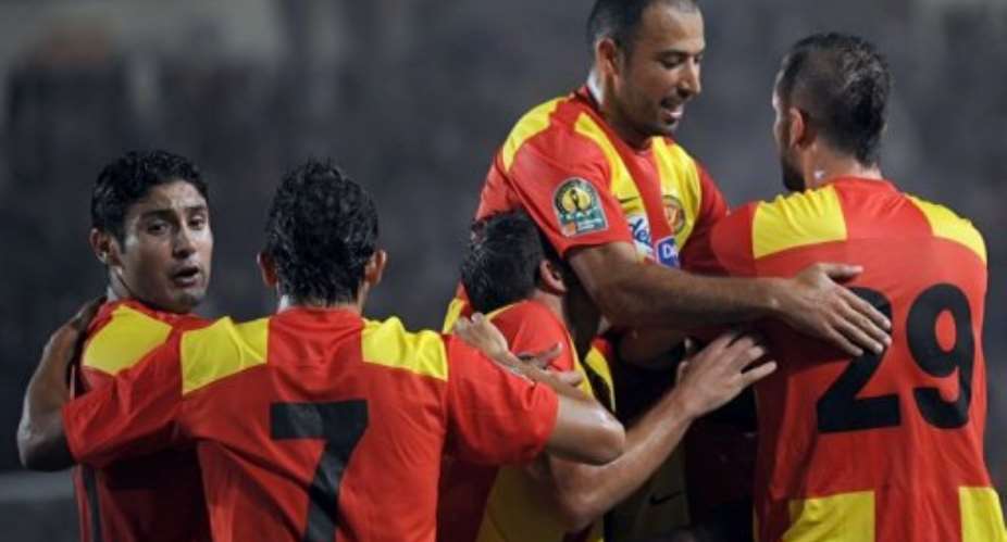Esperances players celebrate a goal in July 2.  By Fethi Belaid (AFP/File)