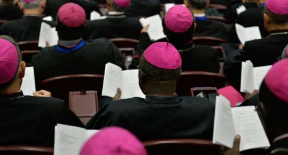 Bishops attend the second morning session of the Synod on the Family at the Vatican on October 6, 2015.  By Andreas Solaro AFPFile