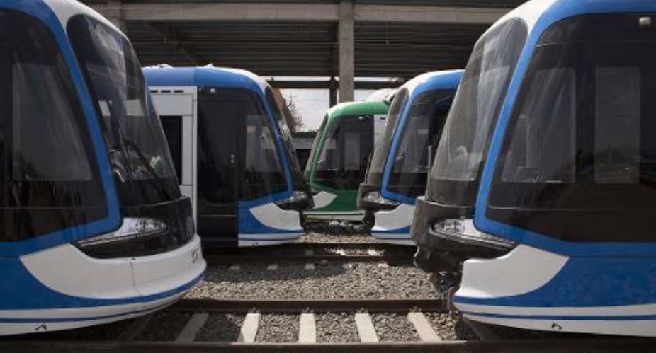 Chinese constructed light rail trains are pictured at the Kality Depot in Addis Ababa on April  3, 2015.  By Zacharias Abubeker AFPFile