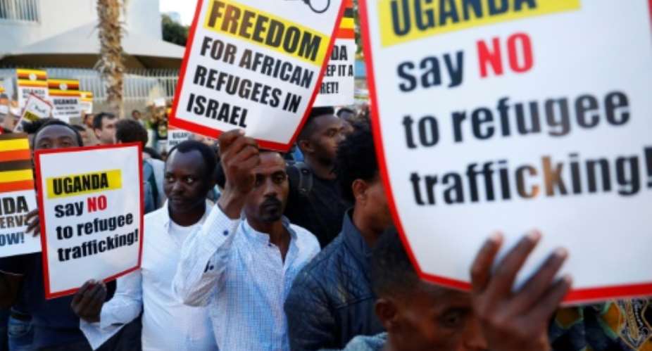 African migrants and Israelis demonstrated in Tel Aviv on April 9 against the Israeli government's deportation plans.  By JACK GUEZ AFP