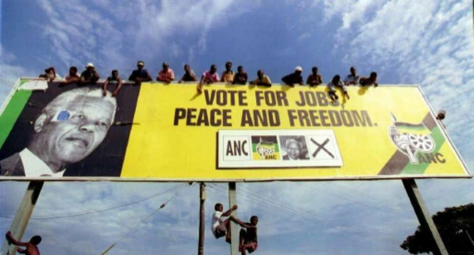 African National Congress ANC supporters seen waiting for Nelson Mandela when he campaigned in 1994 on the promise of a new start for South Africa after decades of apartheid rule.  By ALEXANDER JOE AFPFile