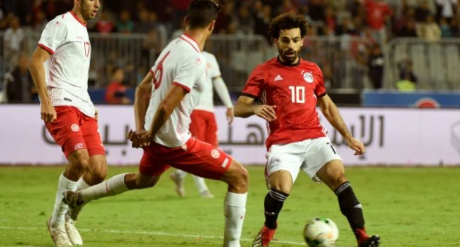 African superstar Mohamed Salah R playing for Egypt against Tunisia in a 2019 Africa Cup of Nations qualifier.  By KHALED DESOUKI AFPFile