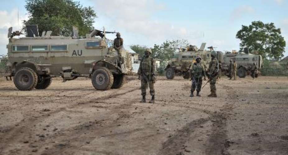 Troops of the African Union Mission in Somalia AMISOM arrive in the town of Kurtunwaarey in the Lower Shabelle region of Somalia, liberating it from Shebab insurgents, on August 31, 2014.  By Tobin Jones AMISOMAFP