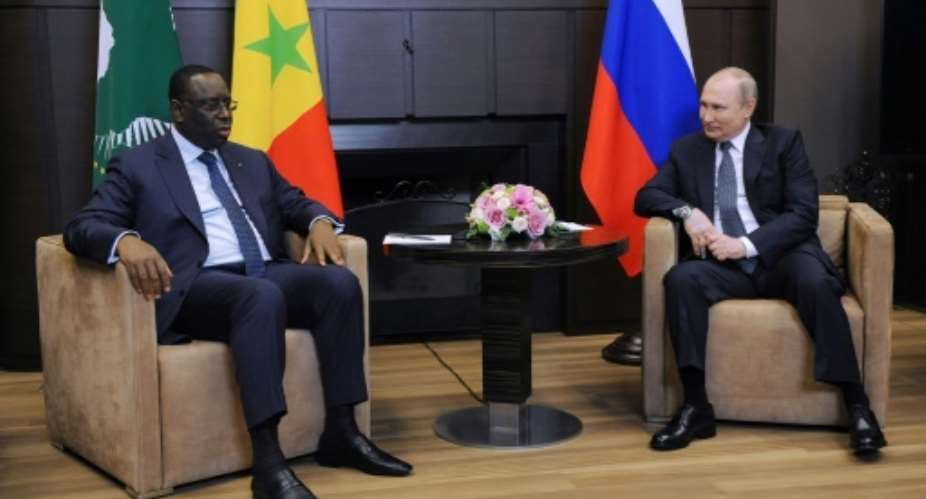 African Union head Macky Sall told Vladimir Putin that Africans were 'victims' economically of the conflict in Ukraine.  By Mikhail KLIMENTYEV SPUTNIKAFP