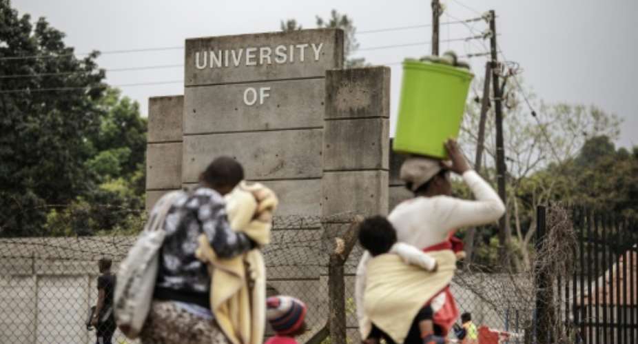 After Swaziland changed its name earlier this year to eSwatini, the nine letters spelling out the old name of the country were removed from the university sign, and new letters have not yet arrived.  By GIANLUIGI GUERCIA (AFP)