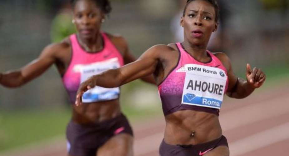 Ivory Coast Murielle Ahoure (R) competes to win the womens 200m event on June 6, 2013 at the Rome Golden Gala.  By Alberto Pizzoli (AFP)
