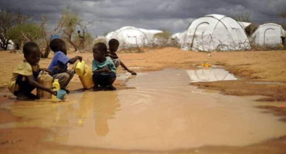Children gather water in the Dadaab refugee camp.  By Tony Karumba AFPFile