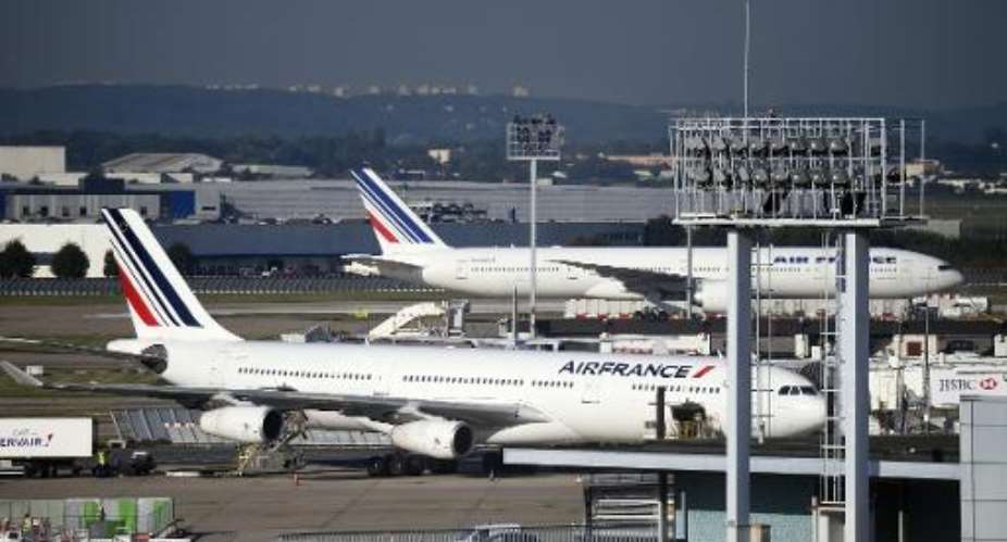 Air France planes are parked on the tarmac at Orly's airport, near Paris, on September 18, 2014.  By Eric Feferberg AFPFile