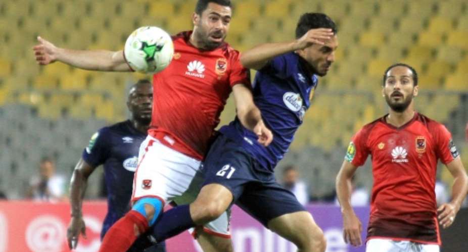 Al Ahly and Esperance battled to an eighth draw in 17 CAF competition meetings.  By STRINGER AFP