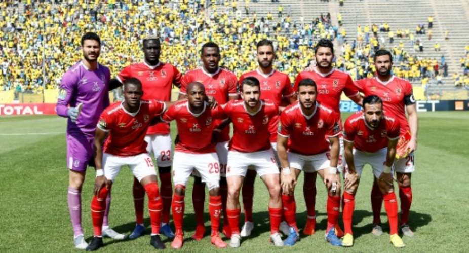 Al Ahly pose before drawing with Mamelodi Sundowns in a 2020 CAF Champions League quarter-final in South Africa.  By Phill Magakoe AFPFile