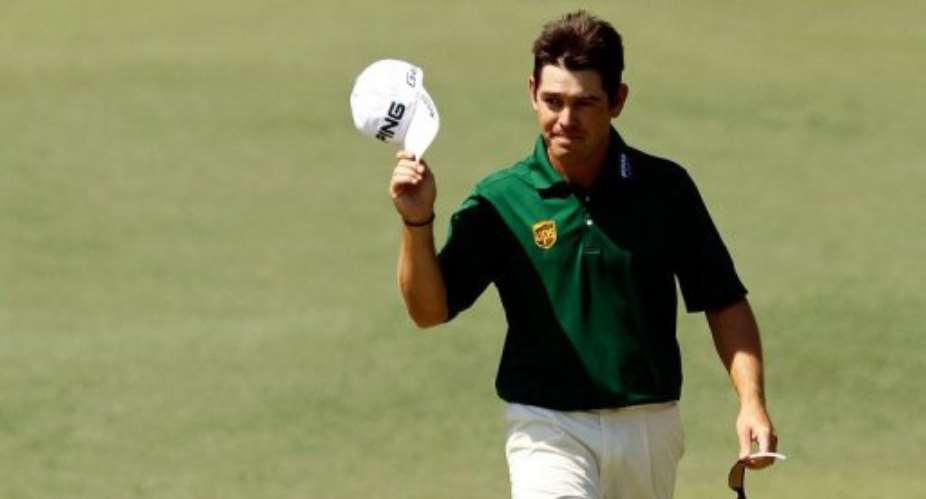 Louis Oosthuizen of South Africa smiles after making an albatross at the Masters.  By Streeter Lecka AFPGetty Images