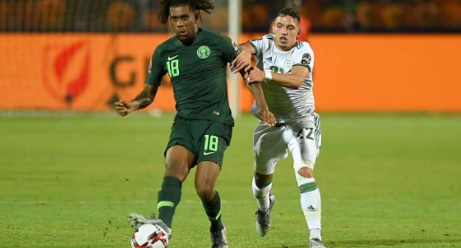 Alex Iwobi L scored twice as Nigeria took a four-goal lead before collapsing in a 4-4 draw against Sierra  Leone Friday..  By MOHAMED EL-SHAHED AFP