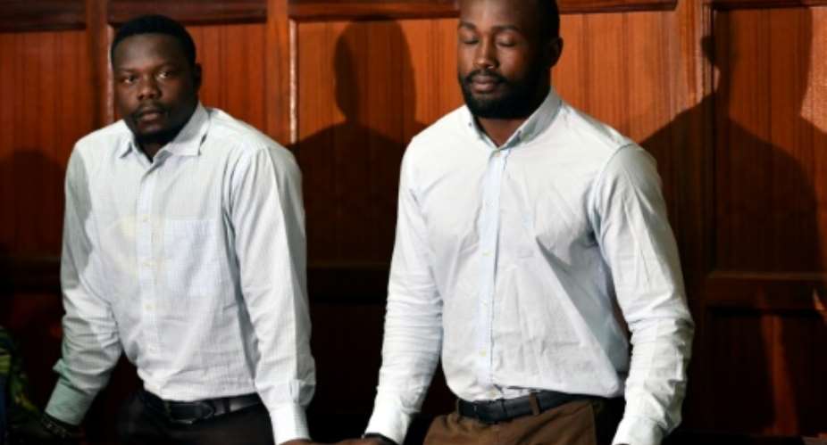 Alex Olaba, left, and Frank Wanyama at their trial in Nairobi last August.  By TONY KARUMBA AFP