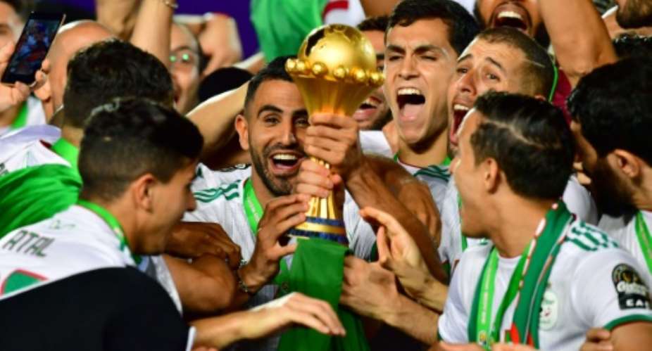Algeria captain Riyad Mahrez C and team-mates celebrate winning the Africa Cup of Nations in Cairo this month.  By Giuseppe CACACE AFP