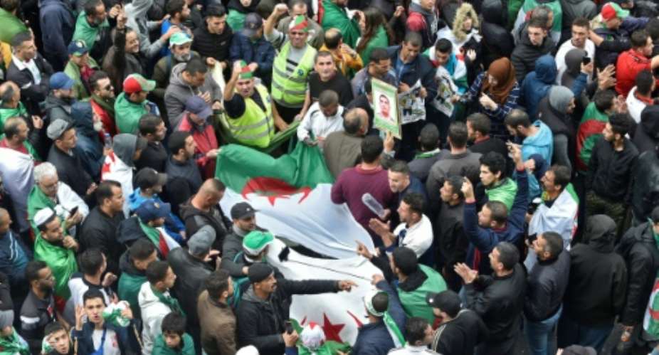 Algeria has been gripped by months of anti-government protests demanding an overhaul of the political leadership and opposed to a presidential election involving figures from the Bouteflika era.  By RYAD KRAMDI AFP