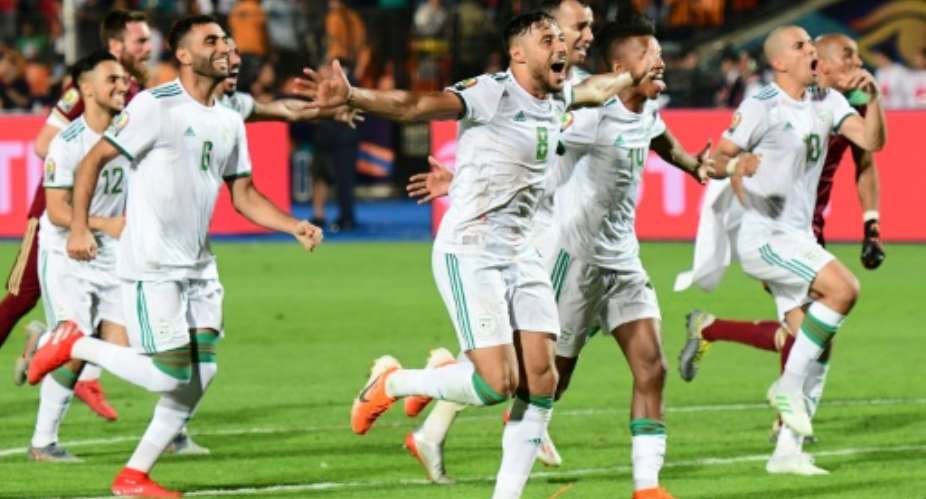 Algeria players celebrate their victory over Senegal in the Africa Cup of Nations final.  By Giuseppe CACACE AFP
