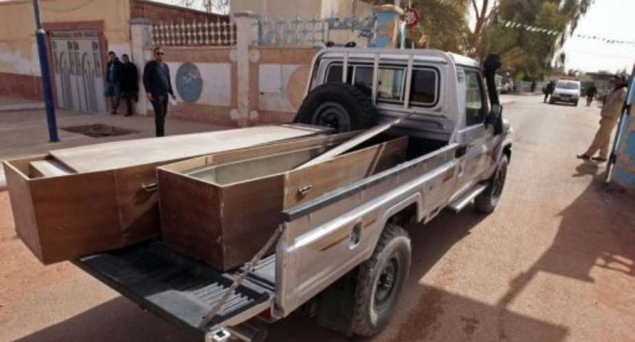 Coffins are transported to collect victims killed during the Algeria hostage crisis on January 21, 2012 in In Amenas.  By Farouk Batiche AFP