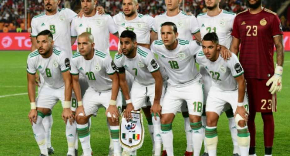 Algeria pose before defeating Senegal in the 2019 African Cup of Nations final in Cairo..  By Giuseppe CACACE AFP