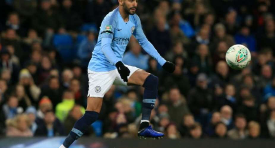 Algeria qualified for the Africa Cup of Nations in their most recent game against Togo with the help of Riyad Mahrez, pictured here playing for Manchester City in November 2018.  By Lindsey PARNABY AFPFile