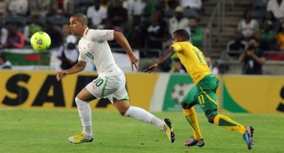 Algeria's Sofiane Feghouli L is pictured during a football friendly against South Africa in Soweto on January 12, 2013.  By Alexander Joe AFPFile