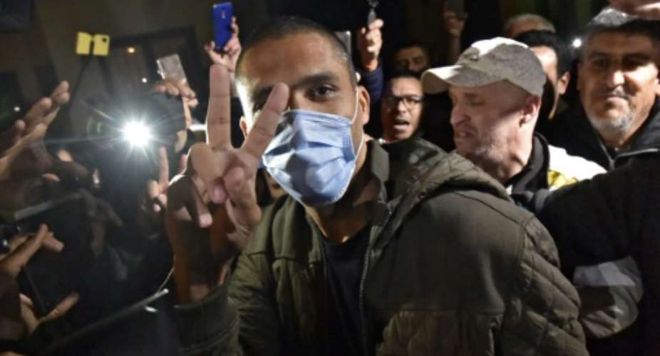 Algerian journalist Khaled Drareni was provisionally released from Kolea prison near the capital Algiers in February.  By RYAD KRAMDI AFP
