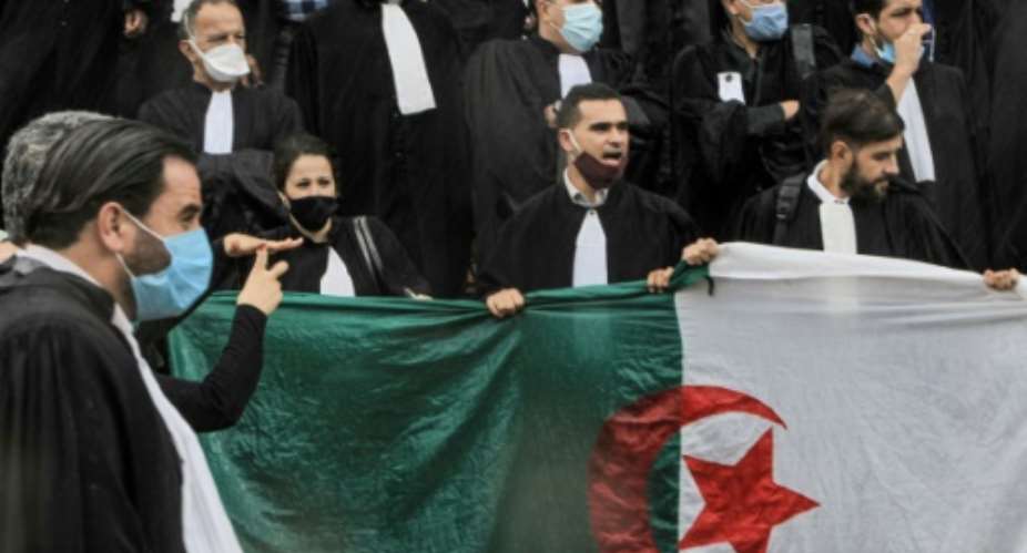 Algerian lawyers demonstrated ouside the Court of Algiers calling for the independence of the judiciary.  By - AFP