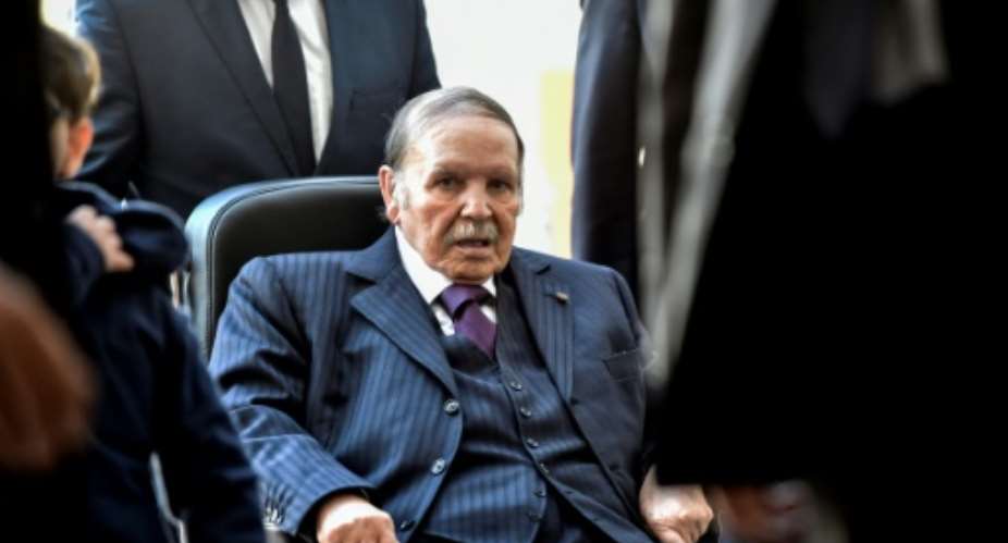 Algerian President Abdelaziz Bouteflika in November 2017 during a rare public appearance after suffering a stroke.  By RYAD KRAMDI AFPFile