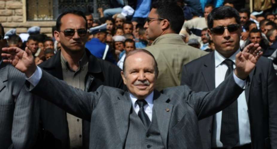 Algerian President Abdelaziz Bouteflika waves to his supporters on March 26, 2009 during an election campaign rally in Oran.  By Fayez Nureldine AFPFile