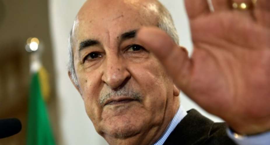 Algerian President Abdelmadjid Tebboune, seen in this December 2019, is hospitalised in Germany where he has received unspecified treatment according to his office.  By RYAD KRAMDI AFPFile