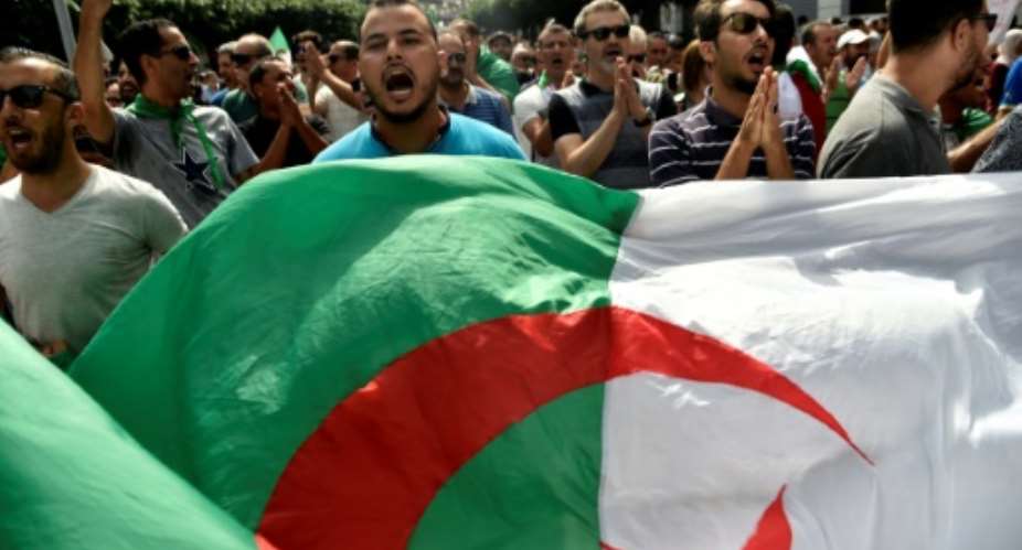 Algerian protesters have been demanding sweeping reforms including the departure of powerful army chief Ahmed Gaid Salah.  By RYAD KRAMDI AFPFile