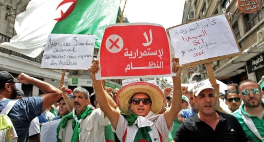 Algerian protesters on Friday braved a large police presence and called for civil disobedience for the first time since they began taking to the streets nearly six months ago.  By - AFP