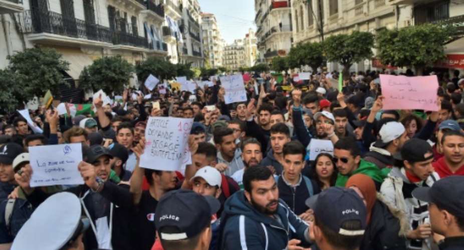 Algerian students are calling on President Abdelaziz Bouteflika not to stand for a fifth term.  By RYAD KRAMDI (AFP)