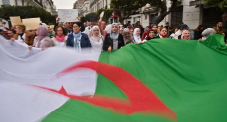 Algerians have demonstrated in their tens of thousands against Bouteflika's bid for another term as president.  By RYAD KRAMDI AFP
