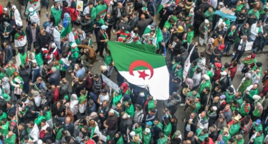 Algerians staged massive demonstrations again on Friday demanding that key figures from former president Abdelaziz Bouteflika's regime follow his lead and quit.  By - AFP