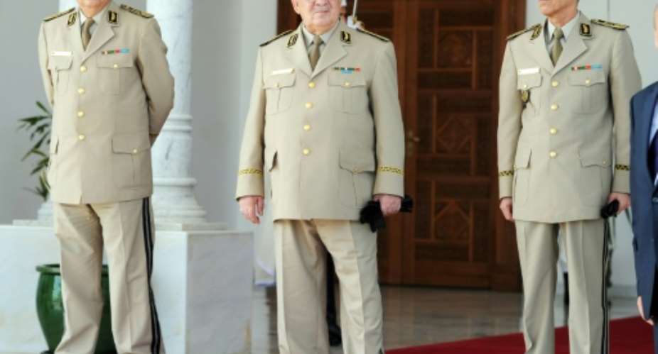 Algeria's military chief Ahmed Gaid Salah C became de facto ruler after veteran president Abdelaziz Bouteflika resigned.  By Farouk Batiche AFPFile