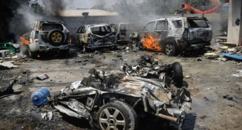Al-Shabaab militants carry out regular attacks in Somalia, reportedly including this January 29, 2019 car bombing which killed two people in Mogadisu.  By Mohamed ABDIWAHAB AFPFile