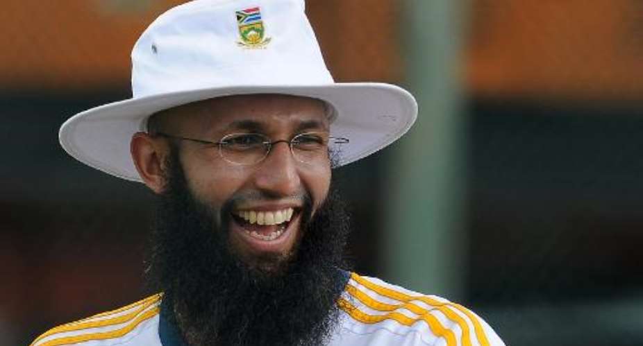 South African cricket team captain Hashim Amla gestures during a practice session at the Galle International Cricket Stadium in Galle on July 15, 2014.  By Lakruwan Wanniarachchi AFPFile