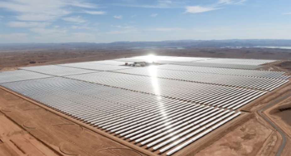 An aerial view of solar mirrors at the Noor 1 Concentrated Solar Power plant outside the town of Ouarzazate. Morocco has already bet heavily on clean energy.  By FADEL SENNA AFPFile