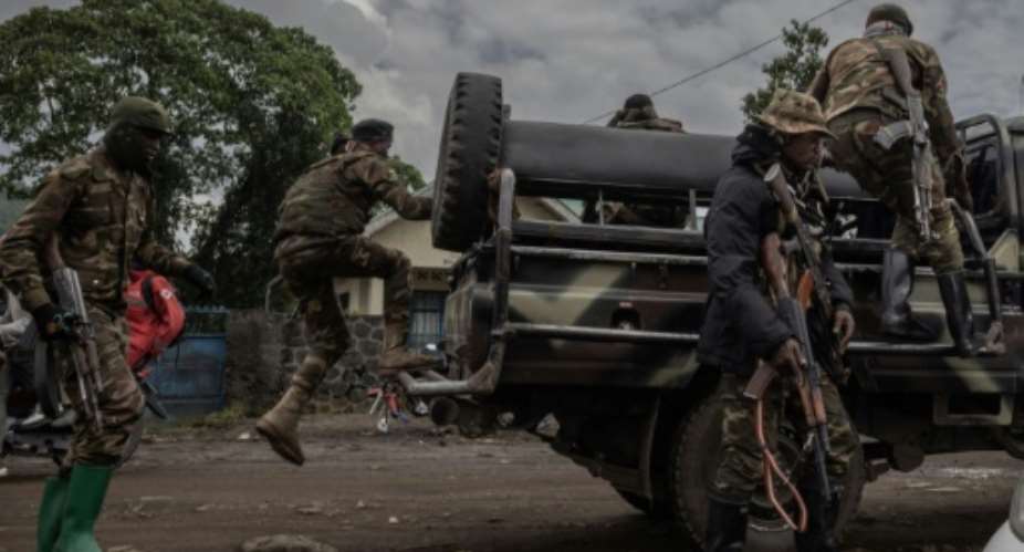 An AFP reporter on the edge of the city saw an army tank and lorry loaded with munitions heading towards the combat zone.  By Guerchom Ndebo AFPFile