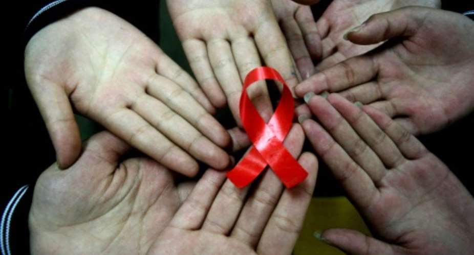 An estimated 38 million people were living with HIV in 2019, according to UNAIDS.  By STR AFPFile