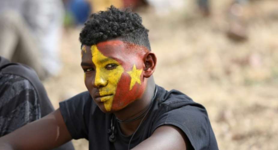 An Ethiopian refugee in Sudan's Um Raquba camp attends a gathering to celebrate the anniversary of the Tigray People's Liberation Front.  By Hussein Ery AFP