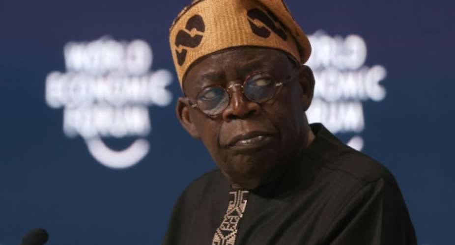 Analysts warn the defections could allow President Tinubu to tighten his grip on power by weakening Nigerias democracy.  By Fayez Nureldine (AFP/File)
