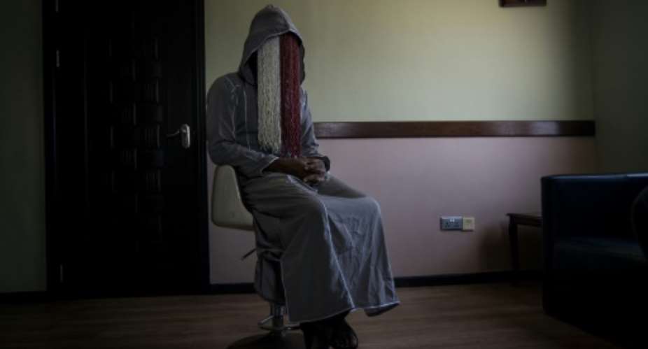 Anas Aremeyaw Anas, pictured here during an interview with AFP last June, led the investigation team that included Ahmed Husein.  By CRISTINA ALDEHUELA AFPFile