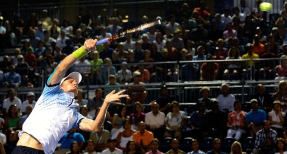 Kevin Anderson of South Africa returns a shot from Malek Jaziri of Tunisia at the Winston-Salem Open at Wake Forest University on August 28, 2015 in Winston-Salem, North Carolina.  By Jared C. Tilton Getty ImagesAFP